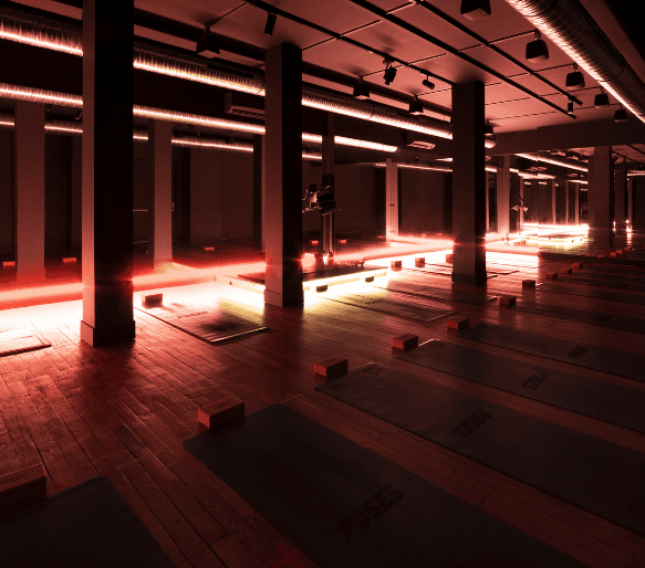 salle de yoga, Pilates et barre au sol avec néons et tapis